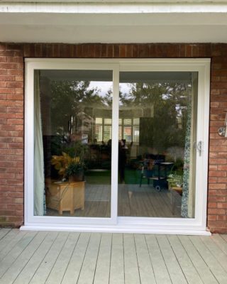 Sliding uPVC patio door with laminated security glass